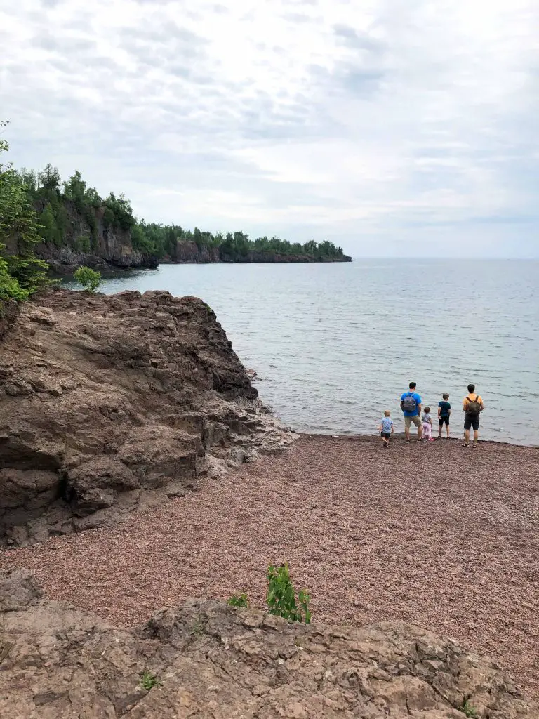 gooseberry falls in two harbors minnesota hiking trail to Lake Superior throwing rocks