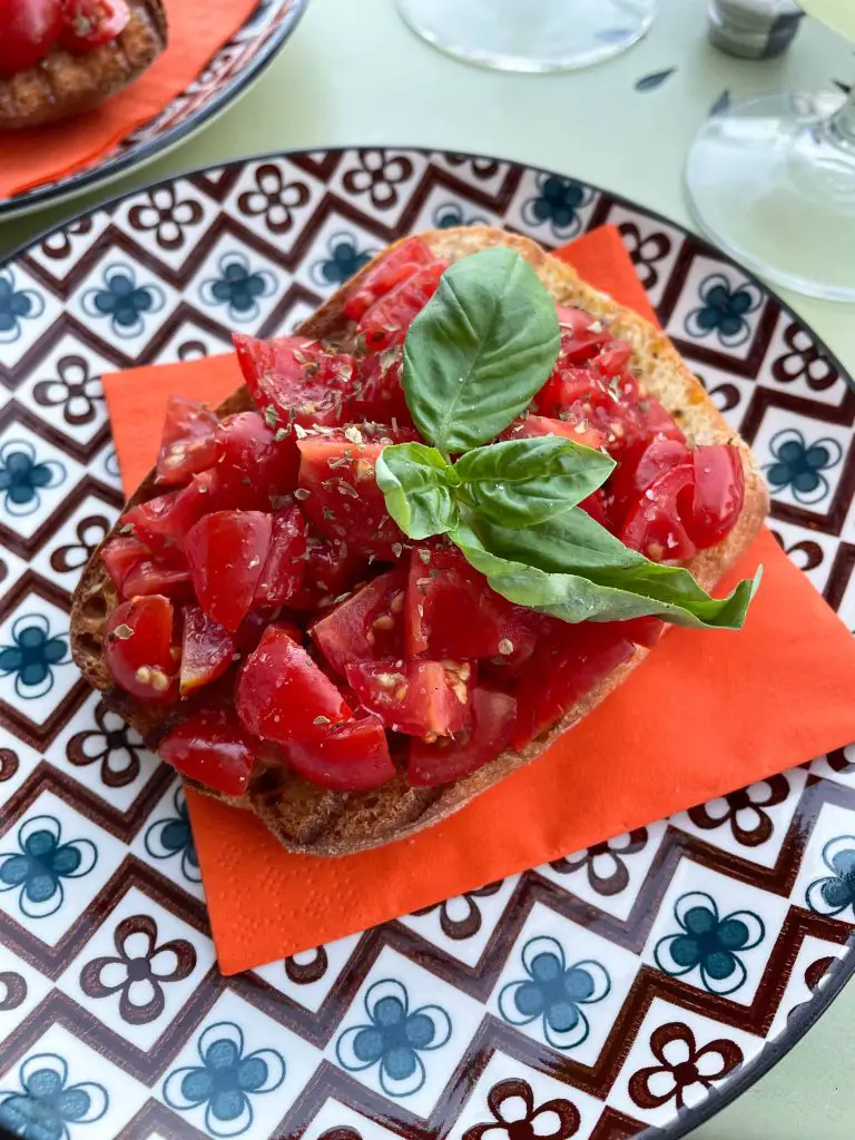 lake como aperitivo bruchetta with lake view